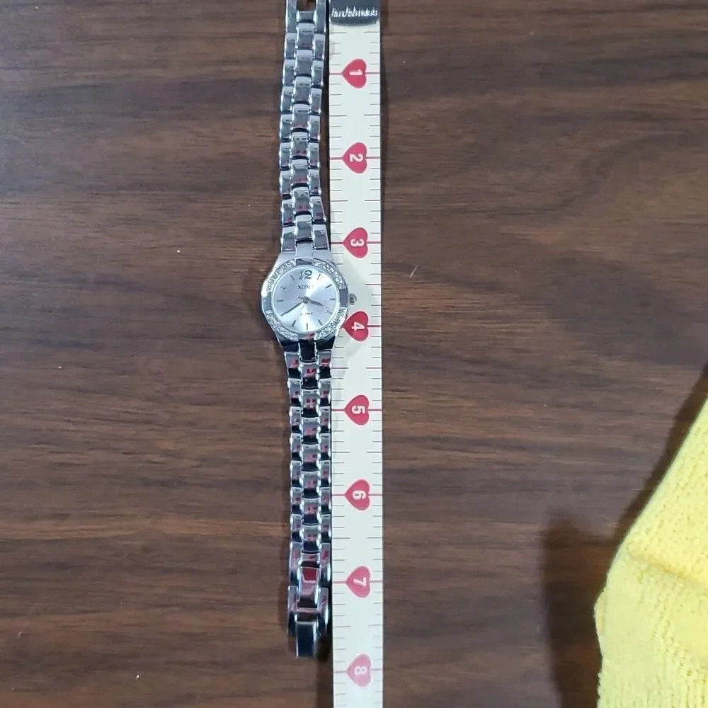 XOXO Women's Silver Watch‎ Crystals Around Watch Face Metal Band